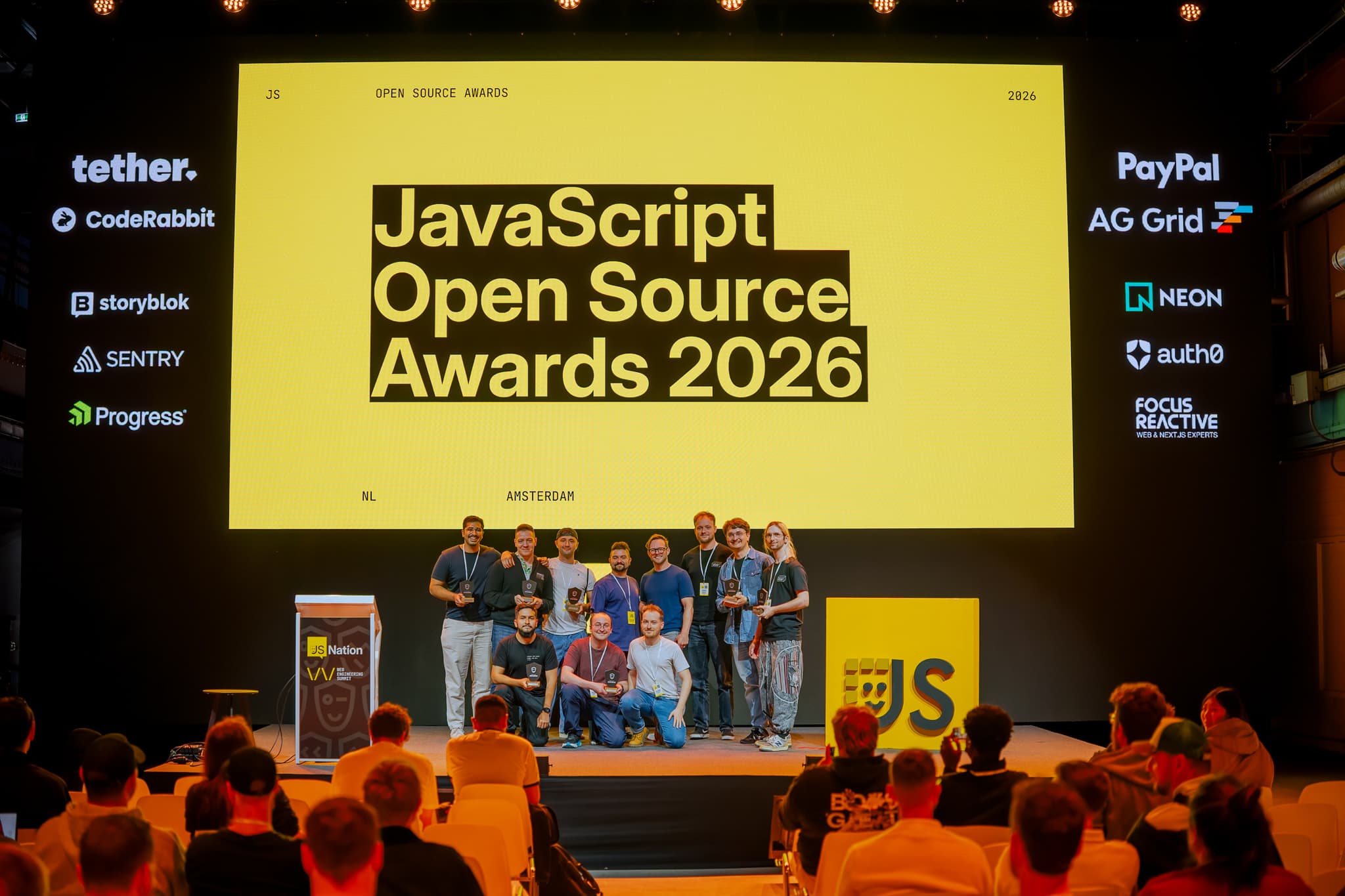 ZurichJS receiving the highest impact community globally award at the OSS Awards during JSNation